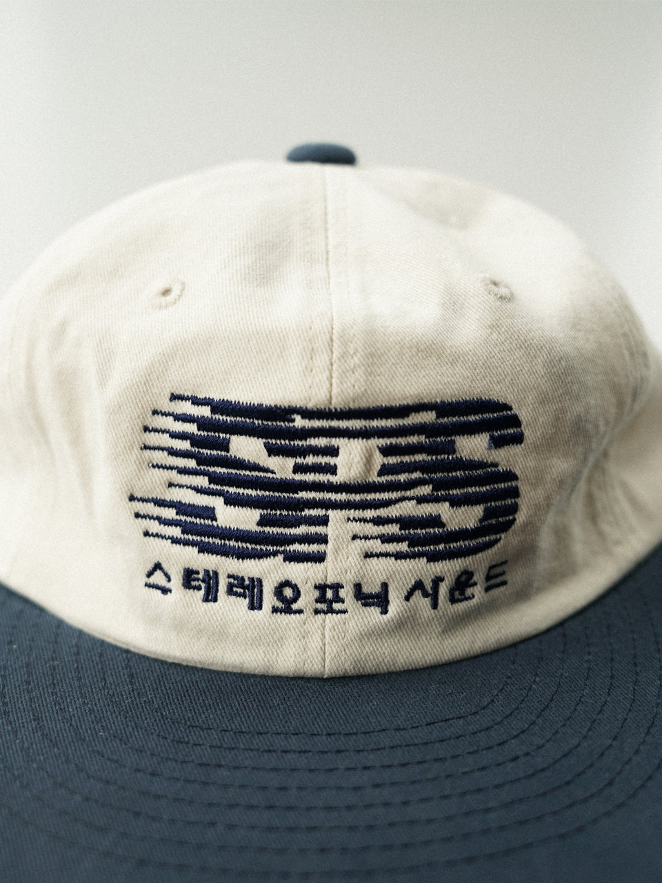 SPS Wave Logo Flat Cap (Ivory-Navy)